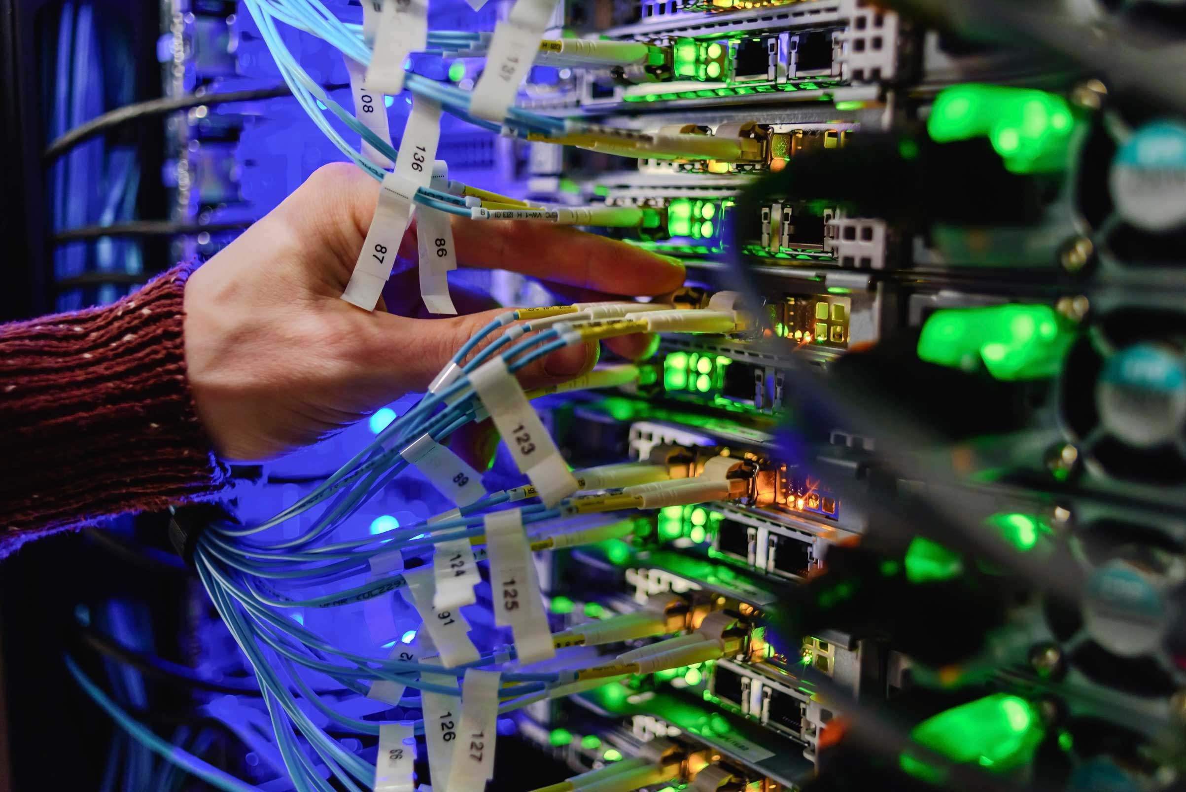 Data center technician performing server maintenance